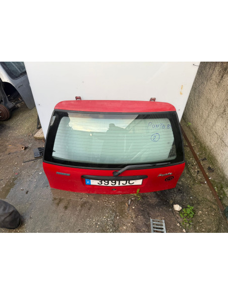 tampa da mala fiat punto 1998