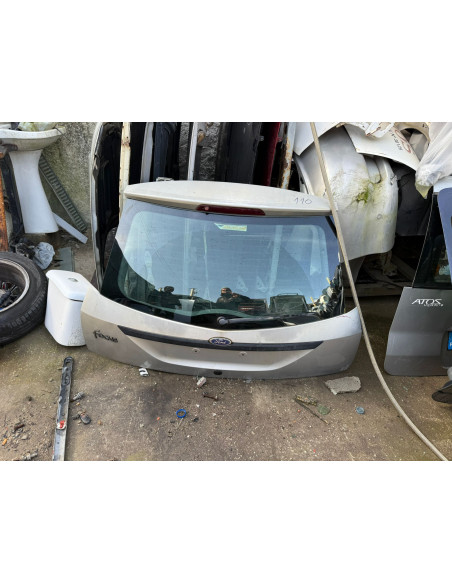tampa da mala ford focus 2000