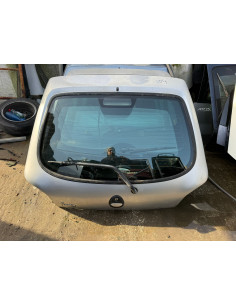 tampa da mala ford fiesta 2000
