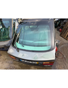 tampa da mala renault laguna 1997