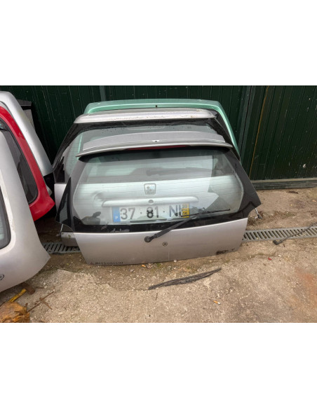 tampa da mala mitsubishi colt