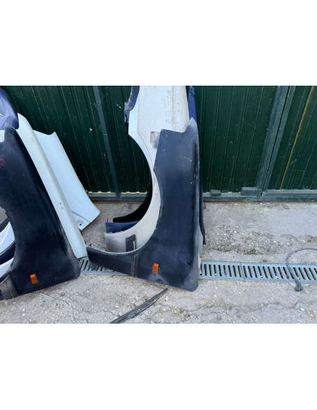 guarda lamas esq peugeot 106