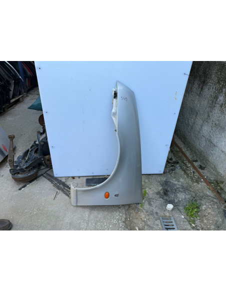guarda lamas esq ford fiesta 2001