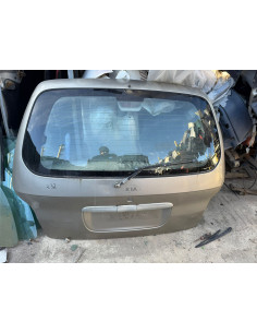 tampa da mala kia carnival 2000